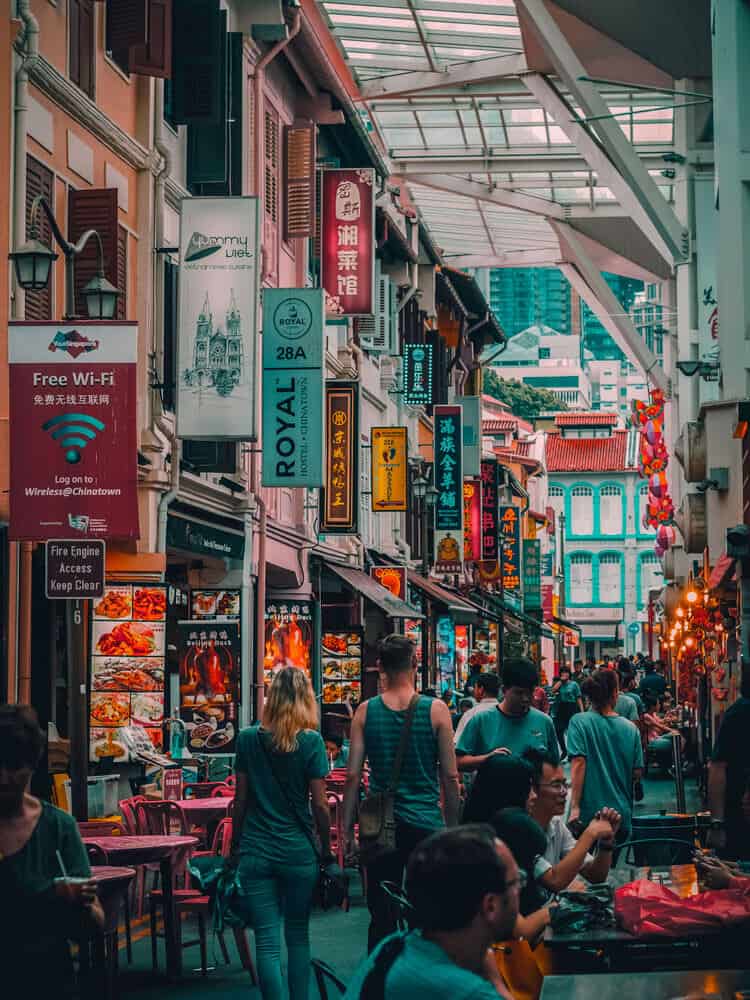 People eating at street market in Singapore