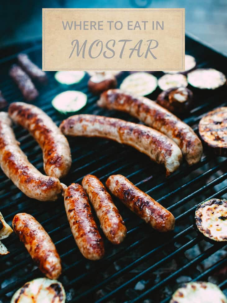 Where to eat in Mostar with sausages grilling at BBQ in the background